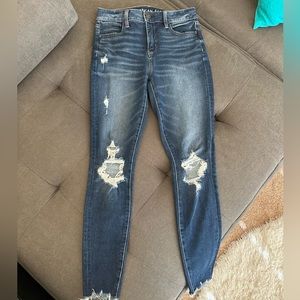 American Eagle distressed skinny jeans size 4 worn once.